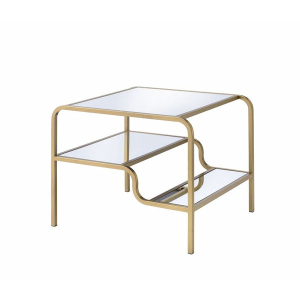  it features a mirror top with a stylish curving frame made of refined gold metal coating. An open base and floati