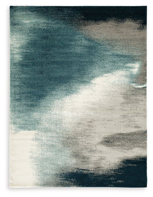 Bring bold, contemporary appeal to your decor with this rug. Crafted with curated style in mind, its blue, gray and ivory hues come together in luxe harmony. Layer the rug on the floor of your living room or bedroom for an utterly indulgent effect.<br/><b