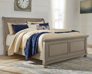  this king sleigh bed sports serene sophistication. Forever classic design details like inset panels and bun feet are so easy to love. A burnished light gray finish elevates the look with modern sensibility