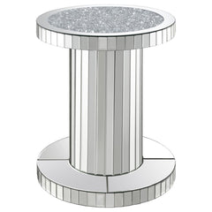 Luxurious elements come together to create a chic vibe in this modern glam accent table. The pedestal style keeps a simple contemporary silhouette that slides into the room effortlessly. Covered entirely in a reflective mirror tile, this accent table is e