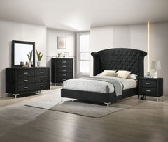 Immerse yourself in the regal charm of this majestic bedroom collection, a true embodiment of luxurious comfort and refined elegance. At the heart lies a bed that commands attention with its impressive wingback headboard, richly upholstered in a rich velv