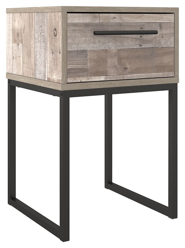 Part beach chic, part urban hip, this nightstand is everything you dreamed of, at a comfortably cool price. The butcher block whitewash finish over replicated pine grain lends a richly relaxed aesthetic that suits your sensibility. A dark pewter-tone draw
