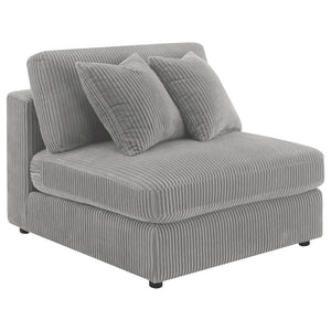 Instill cozy and inviting energy in your den or living room with a modern armless chair. Plush and comfortable, it features soft cushions and wide wale corduroy style upholstery in a soft neutral hue, perfect for augmenting existing seating. The seat and 