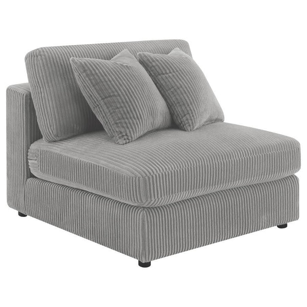 Instill cozy and inviting energy in your den or living room with a modern armless chair. Plush and comfortable, it features soft cushions and wide wale corduroy style upholstery in a soft neutral hue, perfect for augmenting existing seating. The seat and 