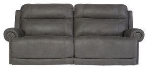 Sparing that -"puffy-" look you might expect from a recliner, this reclining sofa doesn-'t hold back when it comes to contemporary style. Subtle touches such as sporty jumbo stitching, nailhead trim and a -"weather worn-" effect on the upholstery give thi