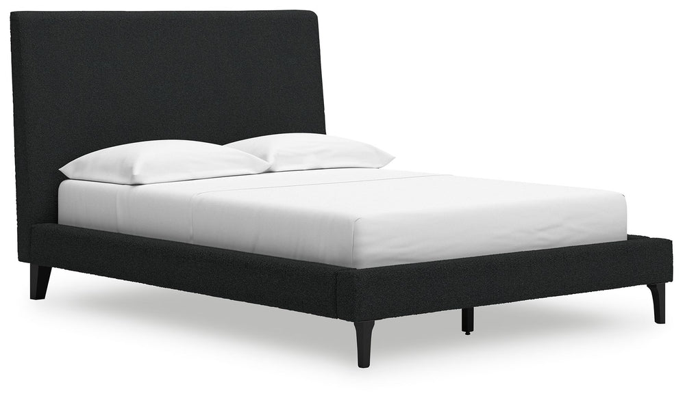 This full upholstered bed reflects your sophisticated approach to boho style. Crafted with both form and function in mind, its black boucle fabric brings trend-right beauty to bedtime. The versatile design suits all-neutral spaces or blends with your favo