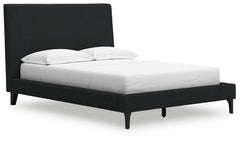 This full upholstered bed reflects your sophisticated approach to boho style. Crafted with both form and function in mind, its black boucle fabric brings trend-right beauty to bedtime. The versatile design suits all-neutral spaces or blends with your favo
