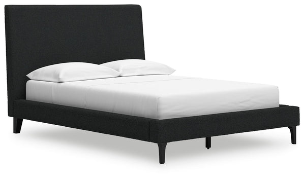 This full upholstered bed reflects your sophisticated approach to boho style. Crafted with both form and function in mind, its black boucle fabric brings trend-right beauty to bedtime. The versatile design suits all-neutral spaces or blends with your favo