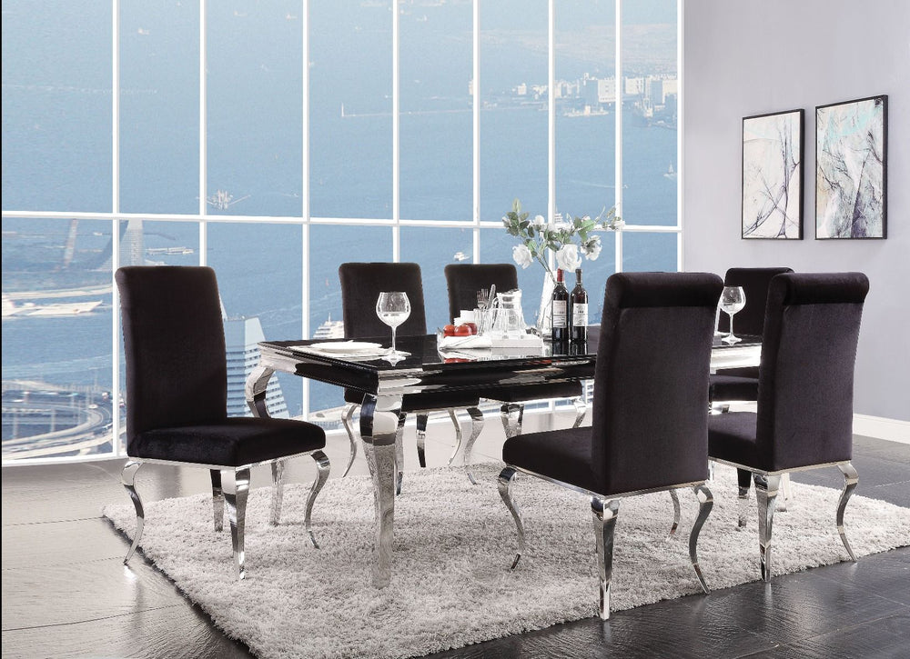 Add a modern touch to your dining room with the Fabiola dining table. With stunning cabriole legs, this beautiful rectangular table will create a dramatic statement in your dining space. Its spacious beveled glass top reveals the stunning stainless-steel 