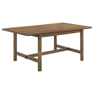 Enjoy the trestle base and inviting style of a modern rectangular dining table. Designed for casual appeal in your kitchen or dining room, it features a natural walnut finish over walnut veneer. The table is a warm and inviting centerpiece for your eat-in