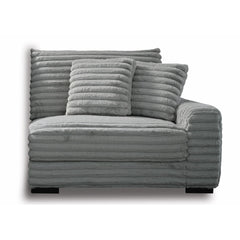 The Embrace Right Arm Facing Chair with 2 Accent Pillows in gray is a sophisticated and comfortable addition to your sectional arrangement. Featuring 100% gray polyester fabric with a fluffy, blanket-like texture, this chair promises ultimate relaxation. 
