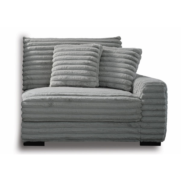 The Embrace Right Arm Facing Chair with 2 Accent Pillows in gray is a sophisticated and comfortable addition to your sectional arrangement. Featuring 100% gray polyester fabric with a fluffy, blanket-like texture, this chair promises ultimate relaxation. 
