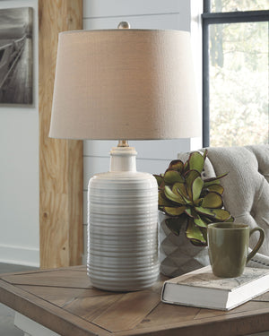  this table lamp lights up our world. The glazed