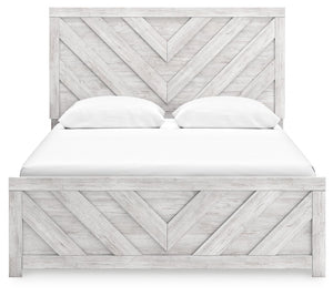  this queen panel bed embraces the aesthetics of countryside living and repurposes them for modern settings. Its whitewash paint