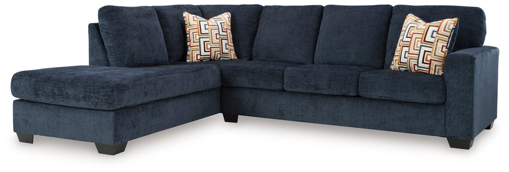 Looking to make a bold statement with color? Liven up your living room with this sectional with chaise. Its trend-right navy blue upholstery adds a playful pop of color to your decor. Bold and eclectic accent pillows complete the look. Pairing posh style 