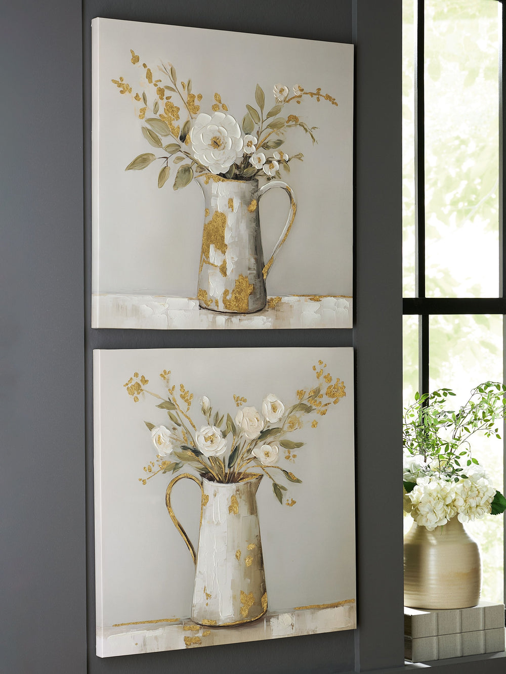 A perfect pair. This wall art set inspires in casual spaces thanks to its unpretentious character. Depicted in beautifully muted hues, the images of florals in vintage-inspired pitchers have a delicate, charming vibe. Such a welcoming addition to your dec