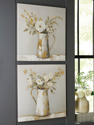  the images of florals in vintage-inspired pitchers have a delicate