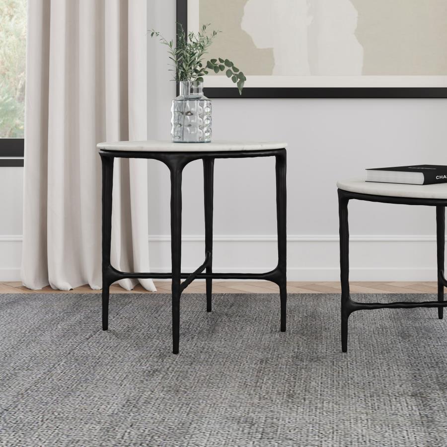 This round end table, crowned by genuine marble, lends sophisticated style to your living room. Its textured metal frame accentuates graceful lines, ensuring it shines as an accent table in both traditional and modern spaces. A side table thatâ€™s as func