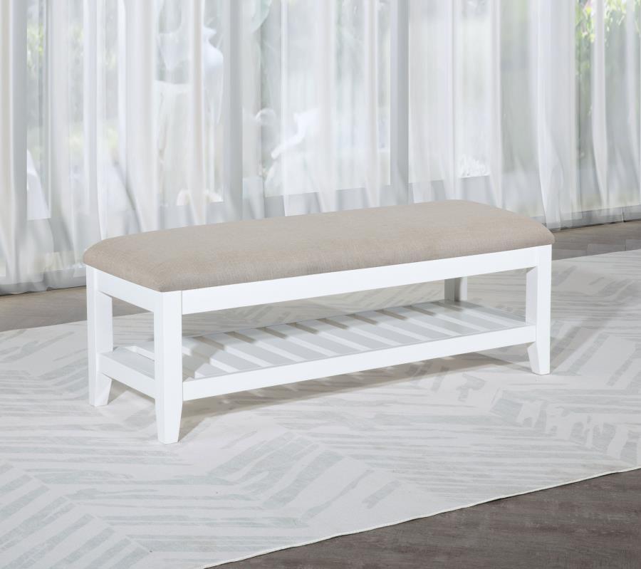 This sleek and versatile bench brings a touch of timeless elegance to any room. Its beige upholstered, foam-padded seat offers exceptional comfort while the sturdy wooden frame, finished in white, ensures long-lasting durability. A slatted shelf beneath t
