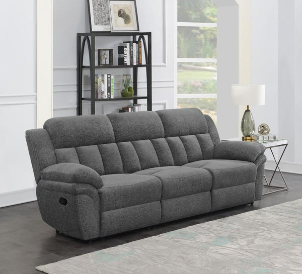  the sofa encourages rest and rejuvenation in inviting style. Charcoal upholstery delivers a smooth
