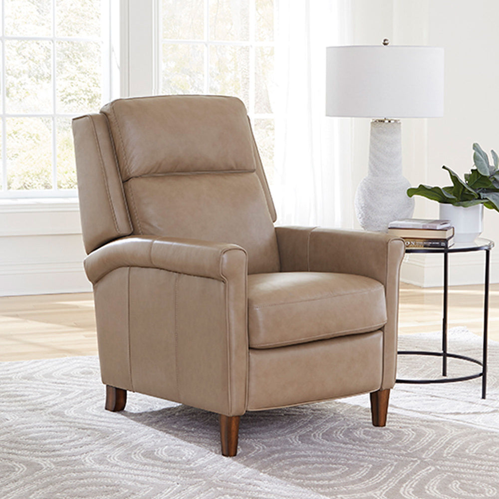 Meet the Northfield power recliner, where effortless relaxation meets sophisticated design. This power recliner is upholstered in soft leather with a custom match, ensuring both style and comfort. The key arm with detail welting adds a touch of elegance, 