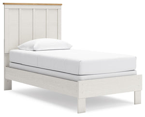 Create a serene countryside retreat with this twin bed. A two-tone design effortlessly adds farmhouse style, while the clean-lined panel headboard enhances its charming appeal. Looking for furniture that offers a peaceful escape from your daily routine? T