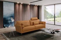 Made in Italy and upholstered in high-quality leather, the Tussio collection offers comfort and style. The gorgeous saddle tan leather finish is modern. Included are bolster cushions and pillows to match the seating. The headrest provides added comfort to