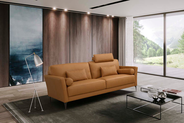 Made in Italy and upholstered in high-quality leather, the Tussio collection offers comfort and style. The gorgeous saddle tan leather finish is modern. Included are bolster cushions and pillows to match the seating. The headrest provides added comfort to