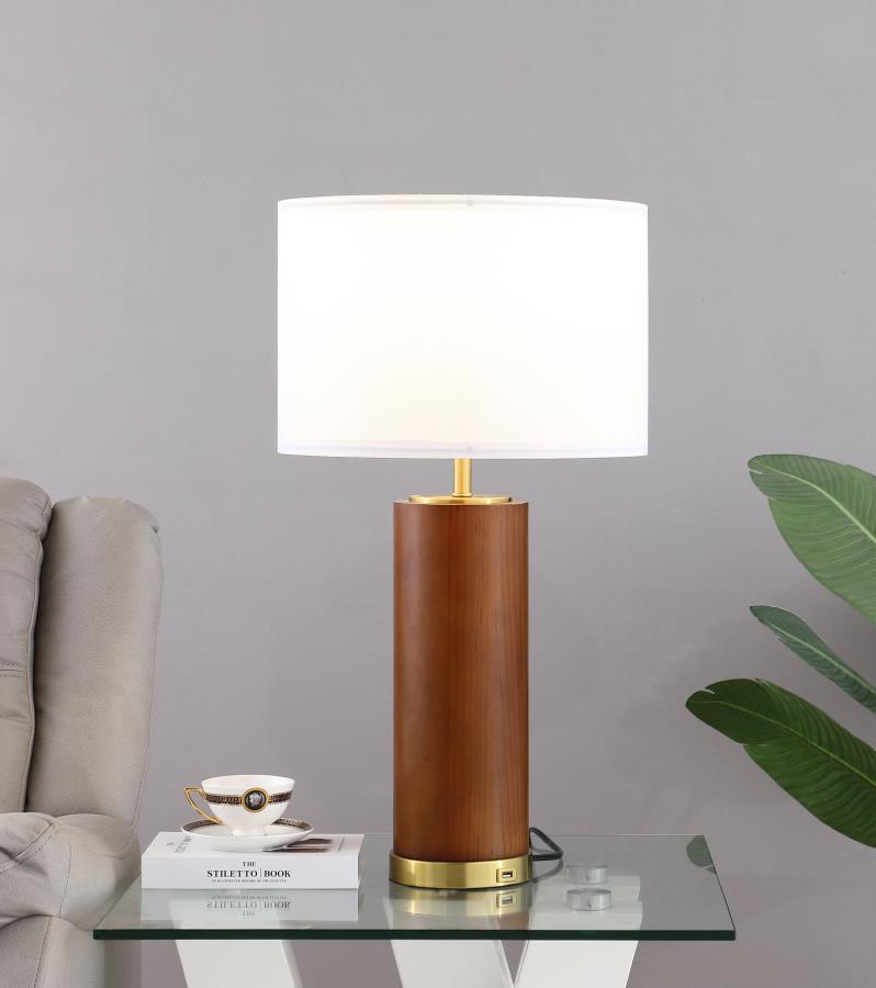 Organic vibes soften the crisp aesthetic of a table lamp with plenty of versatility. This column lamp features a cylinder base covered with rich cappuccino wood construction, adding natural wood grain markings to double down on an earthy motif. Gleaming g