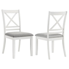 From its neutral palette to its charming details, this modern farmhouse side chair sets the tone in your kitchen or dining room. It shows off a classic stance, with sturdy construction that stands up to daily meals with the family. The chair features a cr
