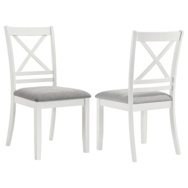 From its neutral palette to its charming details, this modern farmhouse side chair sets the tone in your kitchen or dining room. It shows off a classic stance, with sturdy construction that stands up to daily meals with the family. The chair features a cr