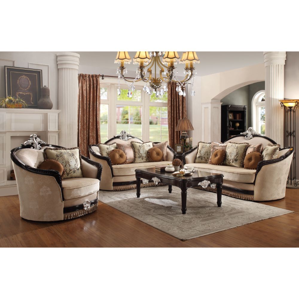 The Ernestine sofa set is an impeccable example of truly remarkable and opulent traditional design. From the curved wood trim on backrest and armrest to the wooden bun leg, every detail boasts old world elegance. Covering in tan fabric, it features tight 