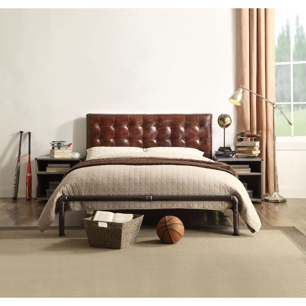 The Brancaster queen bed combines a vintage look with a classical design. This bed features a top grain leather upholstered button tufted head board and sturdy iron metal frame. The elegantly refined detail of this bed gives it a truly unique feel and per