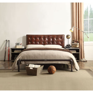The Brancaster queen bed combines a vintage look with a classical design. This bed features a top grain leather upholstered button tufted head board and sturdy iron metal frame. The elegantly refined detail of this bed gives it a truly unique feel and per