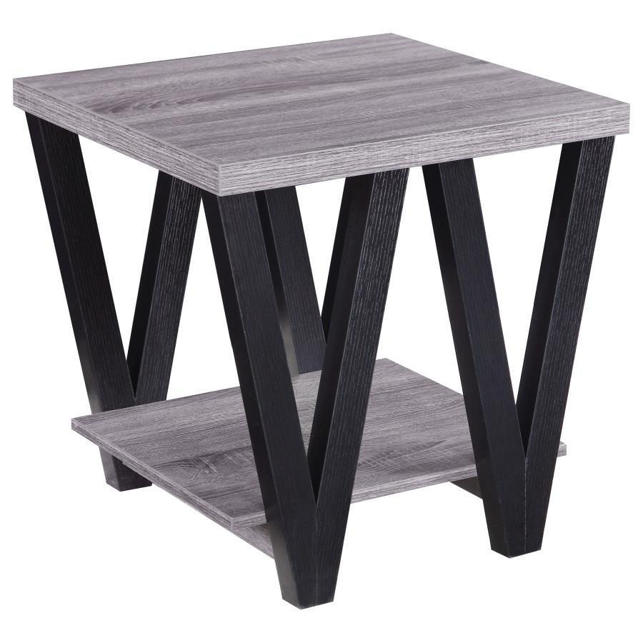 This modern end table combines style and functionality, perfect for contemporary living spaces. The square grey wood-look top and lower shelf, crafted from engineered wood with a durable laminate veneer, provide ample surface area and storage. Black "V"-s