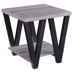 This modern end table combines style and functionality, perfect for contemporary living spaces. The square grey wood-look top and lower shelf, crafted from engineered wood with a durable laminate veneer, provide ample surface area and storage. Black "V"-s