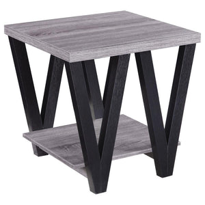 This modern end table combines style and functionality, perfect for contemporary living spaces. The square grey wood-look top and lower shelf, crafted from engineered wood with a durable laminate veneer, provide ample surface area and storage. Black "V"-s