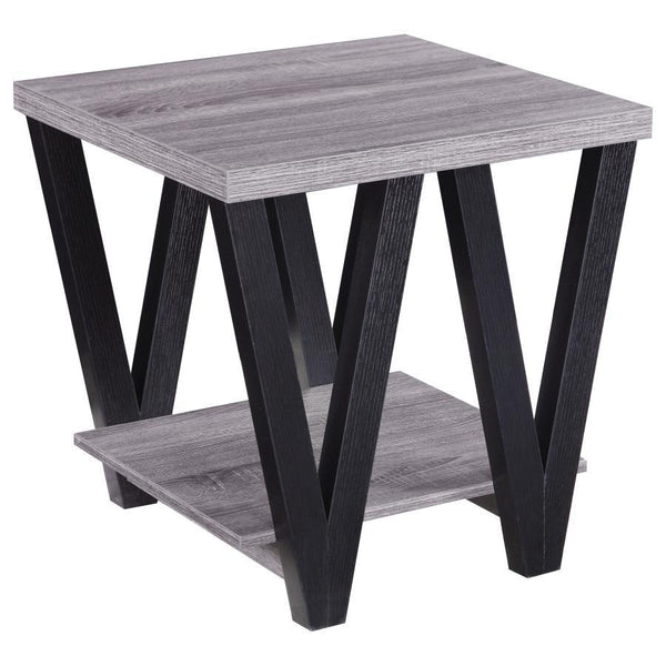 This modern end table combines style and functionality, perfect for contemporary living spaces. The square grey wood-look top and lower shelf, crafted from engineered wood with a durable laminate veneer, provide ample surface area and storage. Black "V"-s
