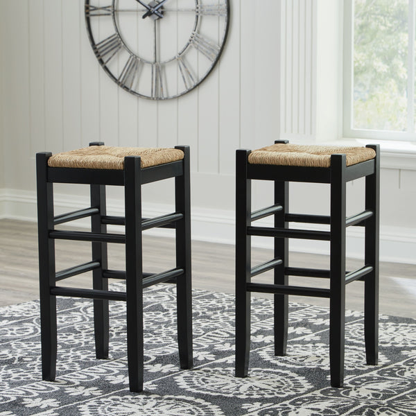  this charming stool completes your dining space with ease. The woven seagrass seat and wood stretchers create an effortlessly bea