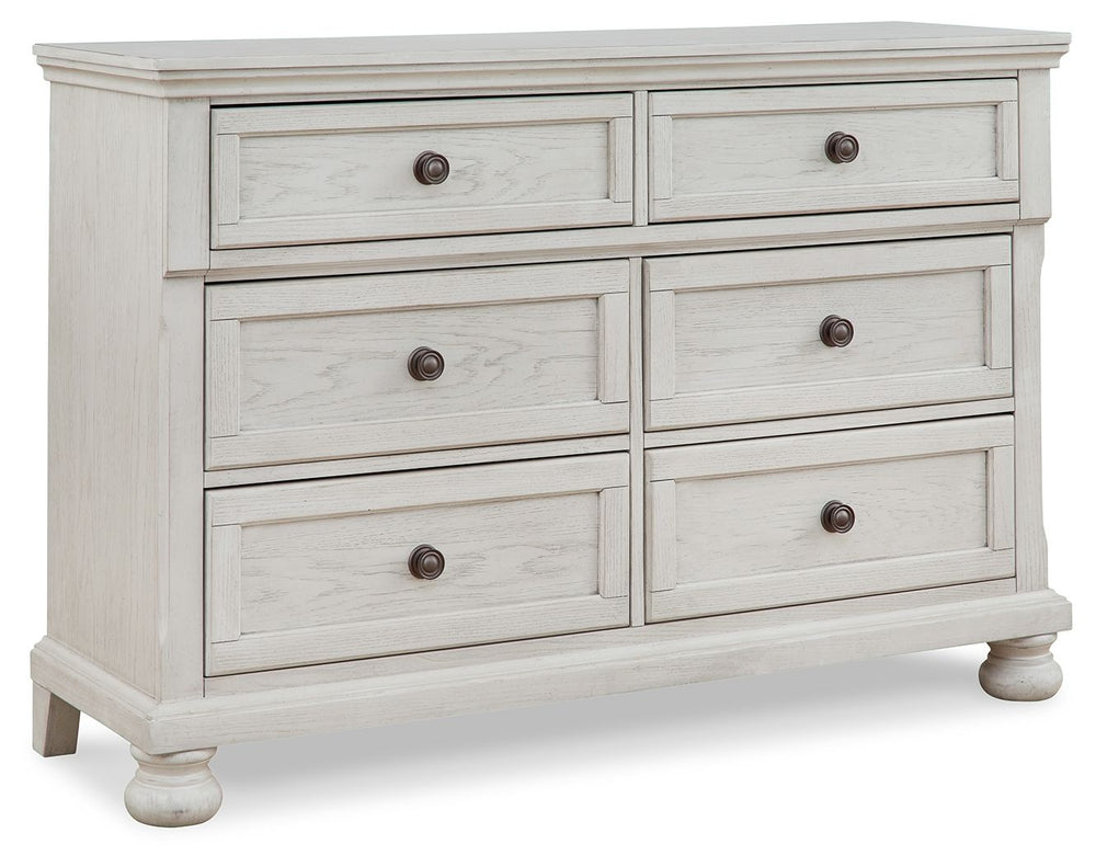 Elegant, timeless furnishings take your bedroom to the next level. Nothing does that better than this dresser. The antiqued white finish with a wonderful grain texture radiates sophistication, while dark bronze-tone knobs add an ornate touch. Felt finishi