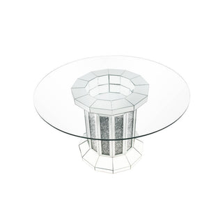 The Noralie dining set is the perfect centerpiece for any social gathering. A clear glass top keeps the focus on the sparkling faux diamond inlay of the pedestal table base. Matching side chairs feature curved cabriole legs in a stainless steel finish tha