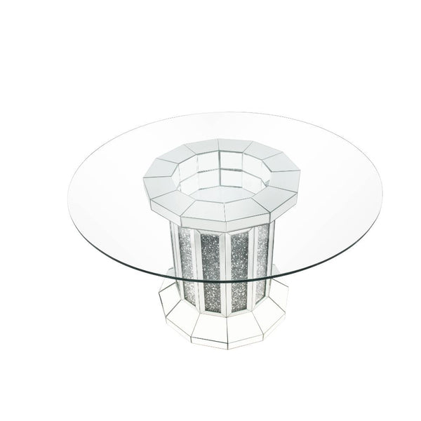 The Noralie dining set is the perfect centerpiece for any social gathering. A clear glass top keeps the focus on the sparkling faux diamond inlay of the pedestal table base. Matching side chairs feature curved cabriole legs in a stainless steel finish tha