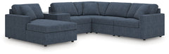 Looking cool and contemporary is great. But when it comes down to it, youâ€™re all about low-maintenance lounging. With the performance fabric on this sectional with console, cleaning spills is a breeze. Its customizable modular design caters to your ever
