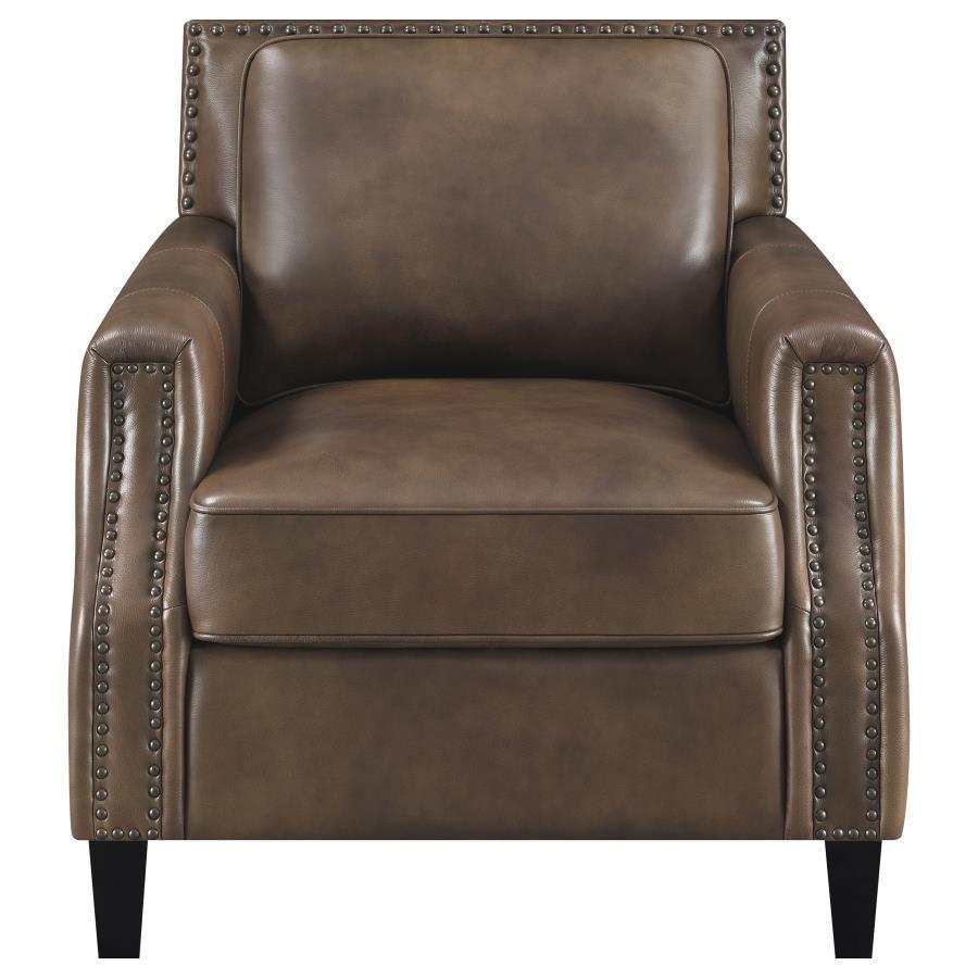 Sit back and settle into this leather grain upholstered armchair. Recessed arms and pillow top cushions make for an exceptionally comfortable seating space. Nail head trim enhances the frame while welted trim on the cushions creates aesthetic interest. Lu