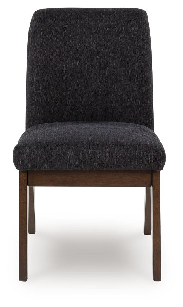Casual contemporary styling with a decidedly modern vibe. Sitting atop a mid-century inspired base, this upholstered bucket dining chair has a rich warm brown finish that beckons everyone to gather around. Black textured upholstery dresses the chair in on