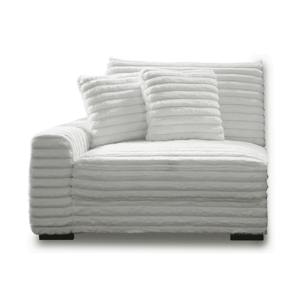 The Embrace Left Arm Facing Chair with 2 Accent Pillows in white is a sophisticated and comfortable addition to your sectional arrangement. Featuring 100% white polyester fabric with a fluffy, blanket-like texture, this chair promises ultimate relaxation.