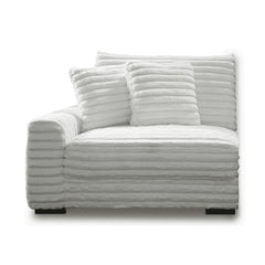 The Embrace Left Arm Facing Chair with 2 Accent Pillows in white is a sophisticated and comfortable addition to your sectional arrangement. Featuring 100% white polyester fabric with a fluffy, blanket-like texture, this chair promises ultimate relaxation.