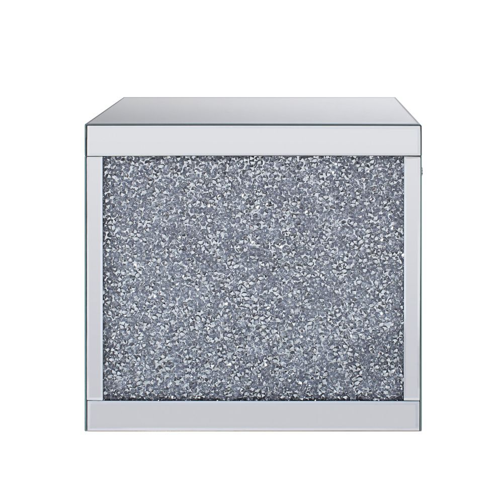 The Noralie End Table will give any room a touch of glamour. This contemporary end table is fully mirrored with a stunning mirror top and a faux diamonds inlay on each leg of its sled base. Use this unique piece as the perfect accent for any room Decor. O