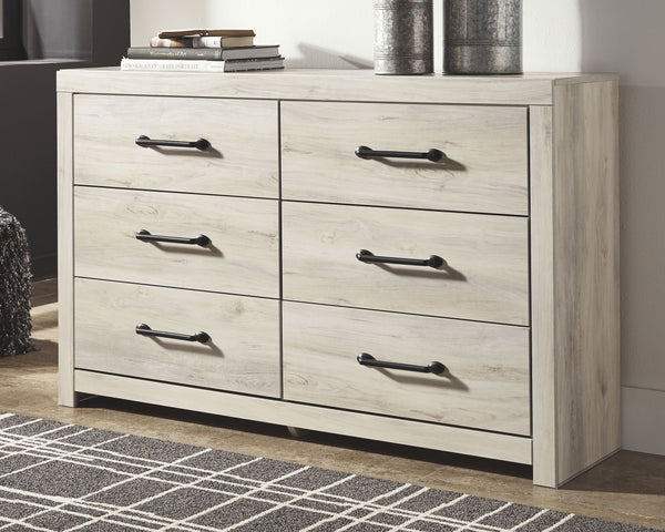  this dresser makes itself at home. The wispy whitewash palette enhances without covering the grain for that weathered look you crave. Elongated drawer pulls elevat
