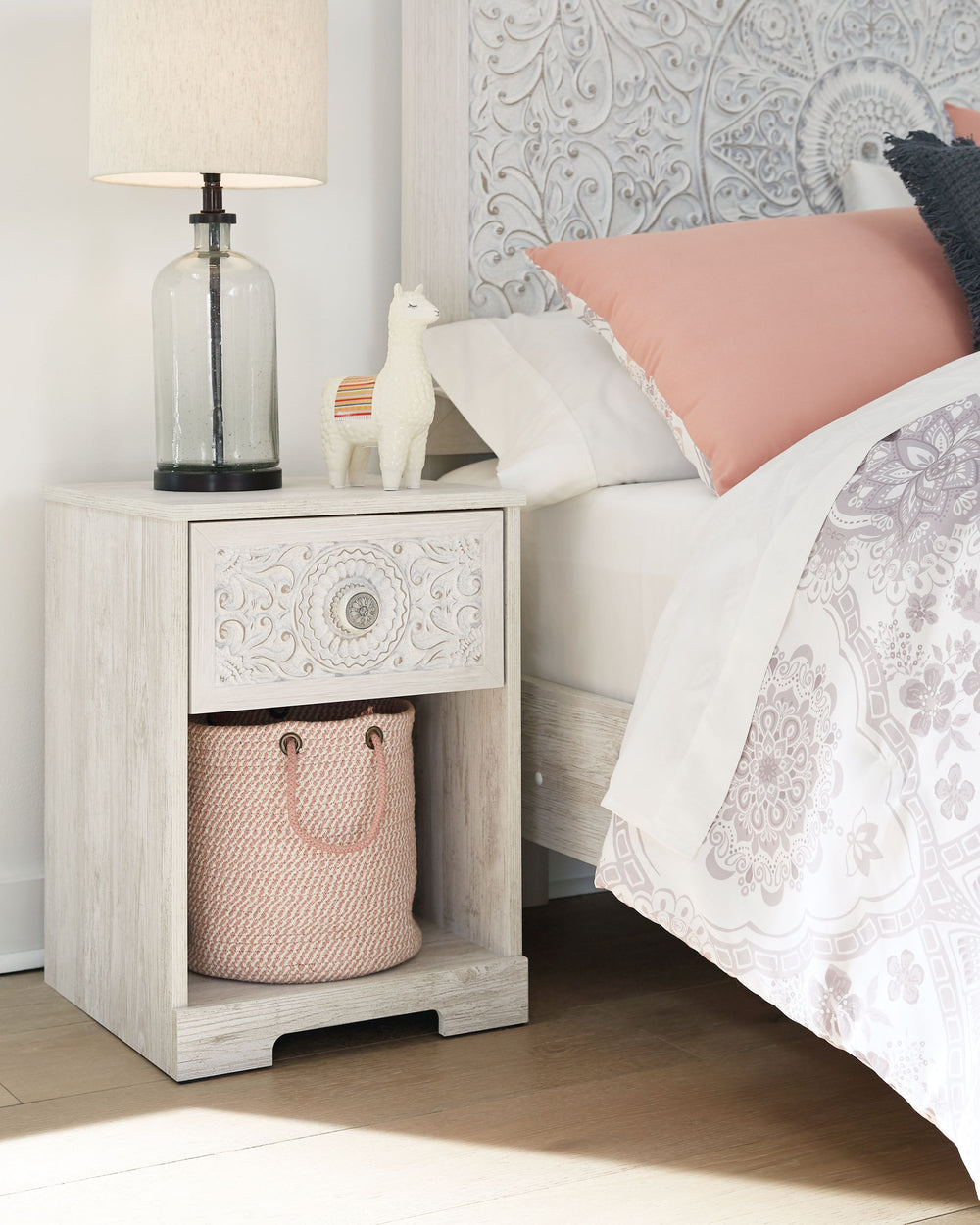 If it-'s coastal chic or cottage quaint style you long for, this whitewashed nightstand invites you to go to town. Its distinctive weatherworn finish conveys an easy-breezy sensibility, perfect for a restful bedroom retreat. Tastefully edited lines and a 
